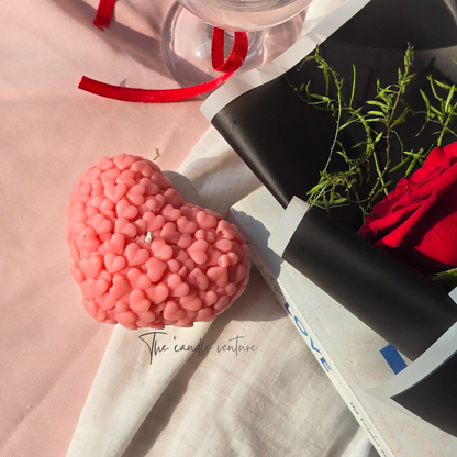 Filled with hearts candle